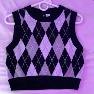 Black,white, and gray vest